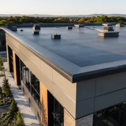 Modern commercial building with a completed flat roof edge